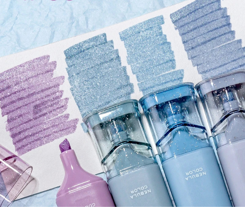 Set of four glittery highliters with color swatches on a light blue background